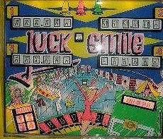 Lucky Smile is a traditional pinball machine released by Inder in 1975, featuring classic mechanical gameplay with vibrant artwork that reflects the era.
