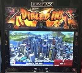 Dialed In! is an innovative pinball machine by Jersey Jack Pinball, integrating smartphone technology with classic pinball gameplay. Designed by Pat Lawlor, it features a narrative focused on an eccentric inventor whose experiments go awry, affecting the city.