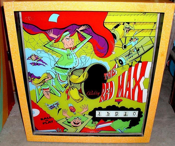 The Red Max is a classic electromechanical pinball machine released by Bally in 1971, known for its intricate and colorful playfield design themed around aviation and comic art.
