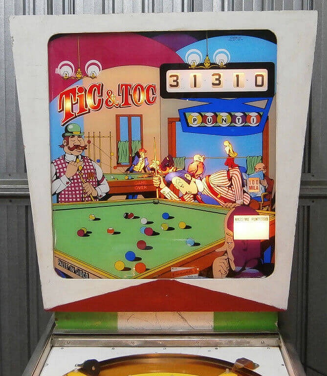 Tic & Toc is a vintage electro-mechanical pinball game released by Europlay in 1973. Known for its unique gameplay and striking design, it is a classic piece of arcade history.