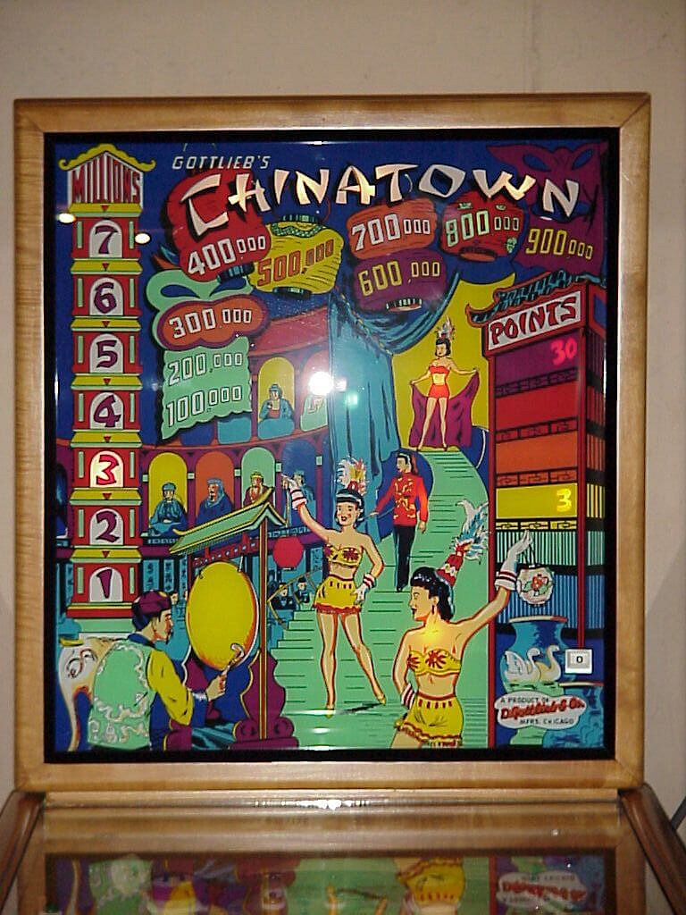 Chinatown is a vintage pinball machine released by Gottlieb in 1952, featuring a classic design representative of the post-war pinball era.