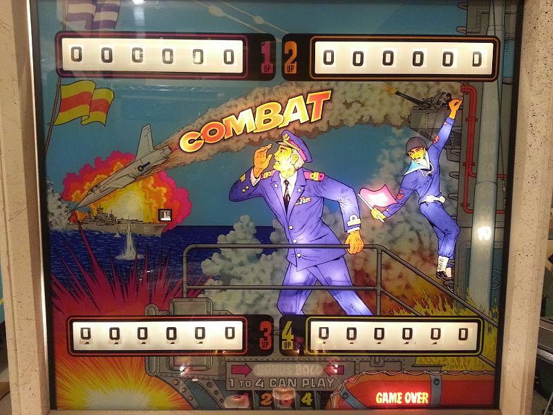 Combat is a vintage pinball machine produced by Zaccaria in 1977. Known for its military theme and engaging gameplay, it features a range of challenging targets and obstacles.