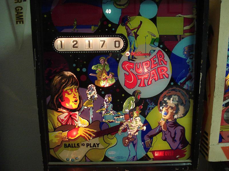 Super Star is a classic electro-mechanical pinball machine released by Williams in 1972, featuring a vibrant starry theme with engaging gameplay aimed at capturing the player's attention.
