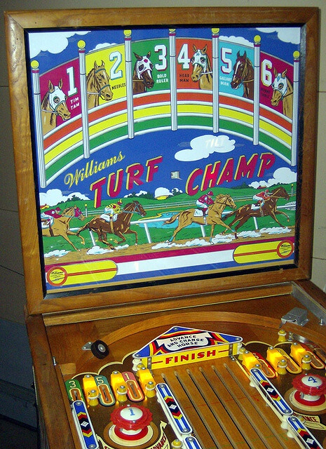 Turf Champ is an arcade game machine by Williams, released in 1958. It was themed around horse racing and featured a unique playstyle where players would bet on mechanical horses.