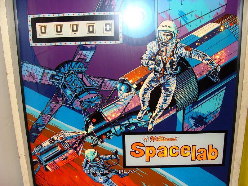 Spacelab is a classic pinball machine released by Williams in 1974, known for its space-themed gameplay and engaging features.