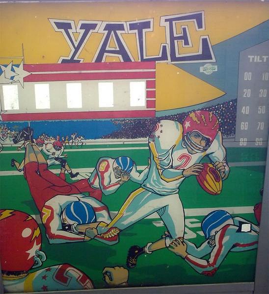 Yale is a pinball machine produced by Inder in 1973. It features a traditional electromechanical layout with vibrant artwork.