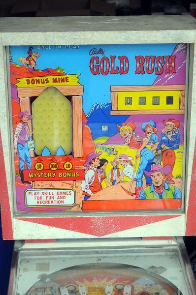 Gold Rush is a classic electromechanical pinball machine designed by Ted Zale and produced by Bally in 1966. The game features a western gold mining theme.