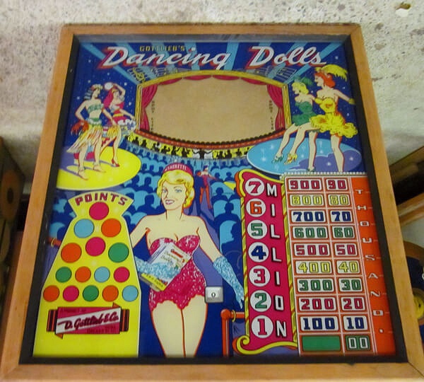 Dancing Dolls is an electro-mechanical pinball machine designed and manufactured by Gottlieb in 1960. It features a lively carnival theme with striking artwork and engaging gameplay mechanics.