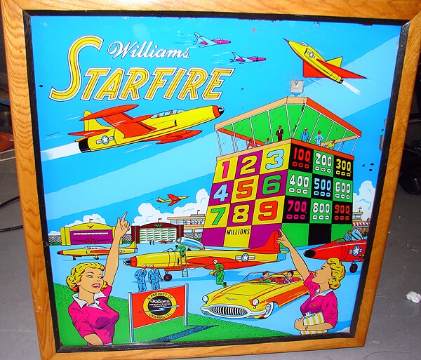 Starfire is a classic pinball machine released by Williams in 1956. It features a space-themed design with vibrant artwork typical of the era.