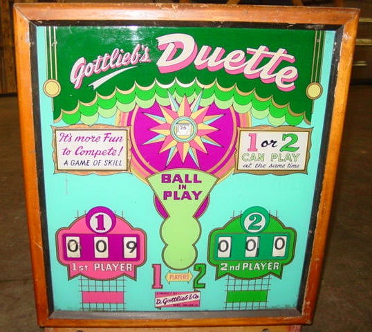 Duette is a vintage pinball machine released by Gottlieb in 1955. It features classic pinball gameplay with mechanical flippers and a distinctive two-player design.