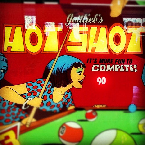 Hot Shot is a classic electro-mechanical pinball machine released by Gottlieb in 1973, featuring a billiards theme.