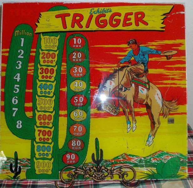 Trigger is a vintage pinball machine that was manufactured by Exhibit Supply Company in 1950. Known for its classic design and simple mechanics, it represents the era's charm with engaging gameplay.