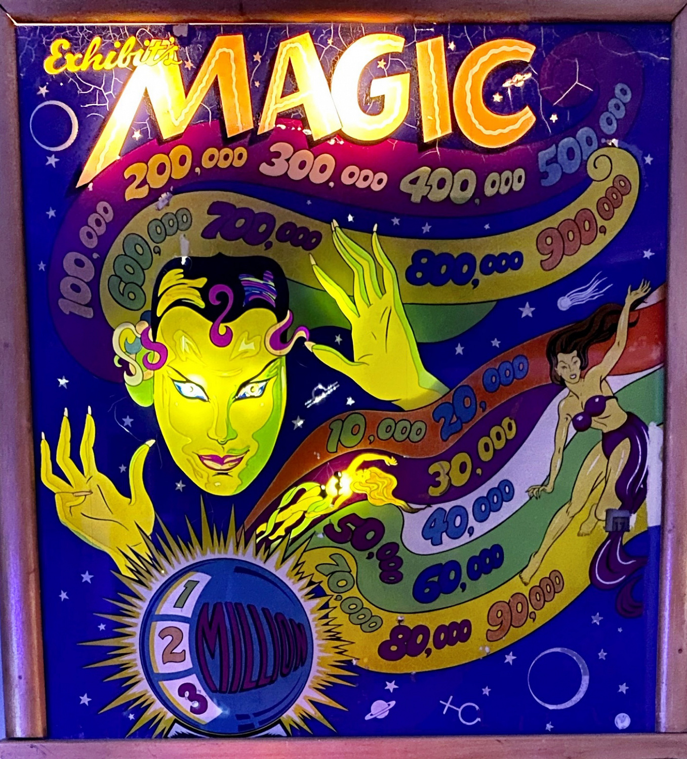 Magic is a classic pinball machine produced by Exhibit, known for its engaging gameplay and mechanical features typical of its era.