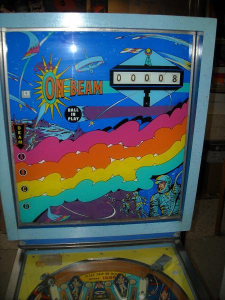 On Beam is an electro-mechanical pinball machine manufactured by Bally, released in 1969. It is known for its space-themed gameplay with engaging mechanics typical of the era.