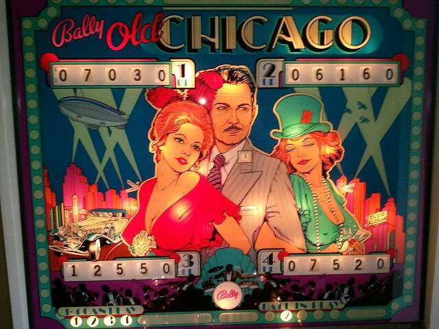 Old Chicago is a classic electro-mechanical pinball machine released by Bally in 1976. It features a captivating 1920s gangster theme with artwork depicting scenes reminiscent of the Prohibition era.
