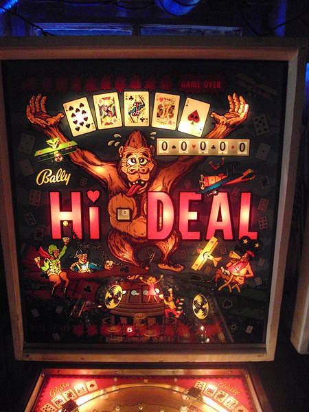 Hi-Deal is a classic electromechanical pinball machine released in 1975 by Bally. The game features distinctive card-themed artwork and gameplay elements centered around poker hands.