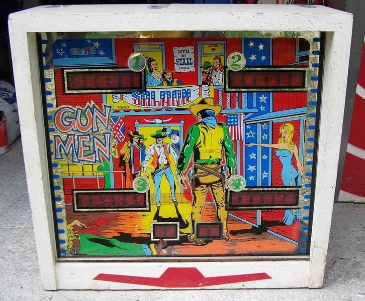 Gun Men is a classic electro-mechanical pinball machine developed by Staal in 1976. The game features a western-themed playfield with intriguing mechanics typical of the era.