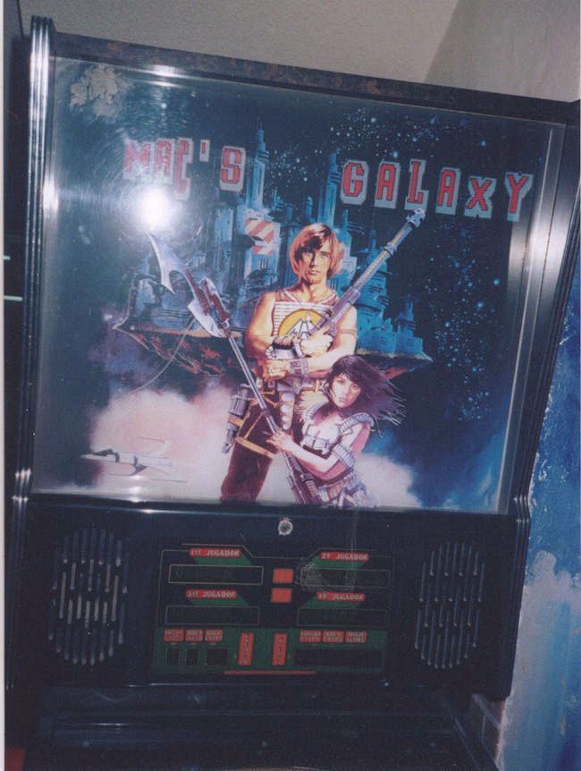 Mac's Galaxy is a classic pinball machine designed and manufactured by Maguinas / Mac Pinball in 1986. It features a space-themed playfield with vibrant artwork and engaging mechanics.