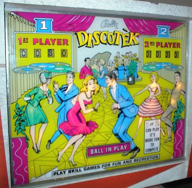 Discotek is a vintage electro-mechanical pinball machine released by Bally in 1965. Known for its distinct disco-themed design and engaging gameplay, it features artwork typical of the era.