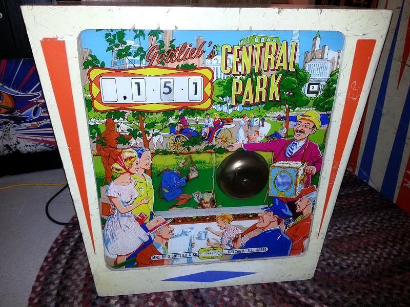 Central Park is a classic electromechanical pinball machine designed by Ed Krynski and released by Gottlieb in 1966. Known for its playful theme and straightforward gameplay, the machine features a unique bell-ringing monkey in the backbox.