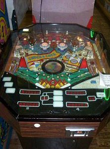 Chuck-A-Luck is a cocktail-style pinball machine released by Game Plan in 1977, known for its unique gameplay and innovative features at the time.
