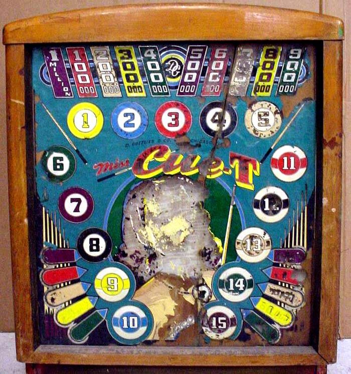 Miss Cue T is a vintage pinball machine released by Gottlieb in 1947. It is known for its classic design and gameplay typical of the era.