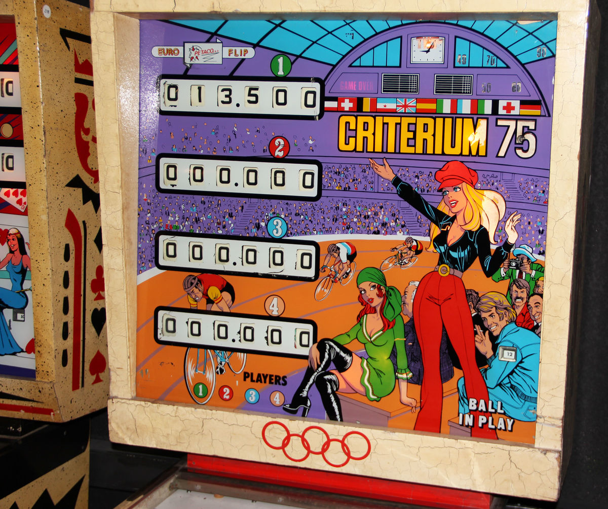 Criterium 75 is a vintage pinball machine produced by Recel in 1974. Known for its classic electromechanical features and retro-themed artwork, it is a notable piece of pinball history.