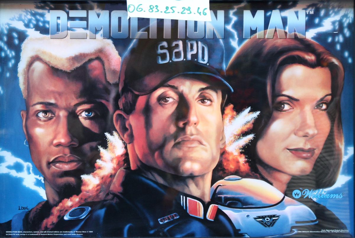 Demolition Man is a widebody pinball machine based on the 1993 movie of the same name. It features fast-paced gameplay with various ramps and toys that represent elements from the film.
