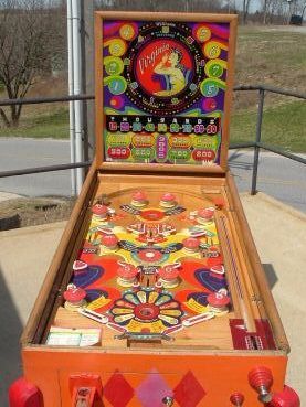 Virginia is a historical pinball machine created by Williams in 1948, known for its classic mechanical design and gameplay characteristic of the post-WWII era.