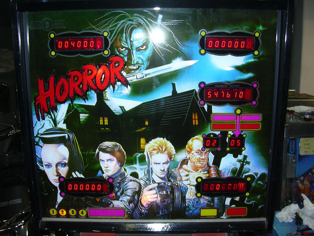 Horror is a classic pinball machine released by Pinball Shop in 1984. The machine features chilling artwork and spooky-themed gameplay, designed to captivate and entertain players with its eerie atmosphere.
