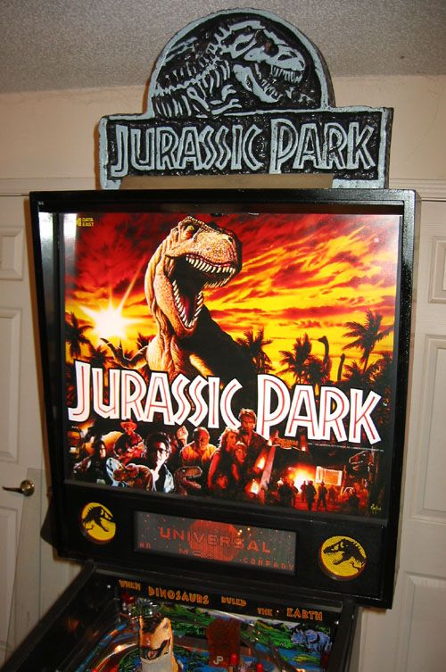 Jurassic Park is a pinball machine designed by John Borg and released by Data East in 1993, inspired by the blockbuster movie of the same name. The game features thrilling gameplay with dinosaurs, iconic scenes, and exciting multiball modes.